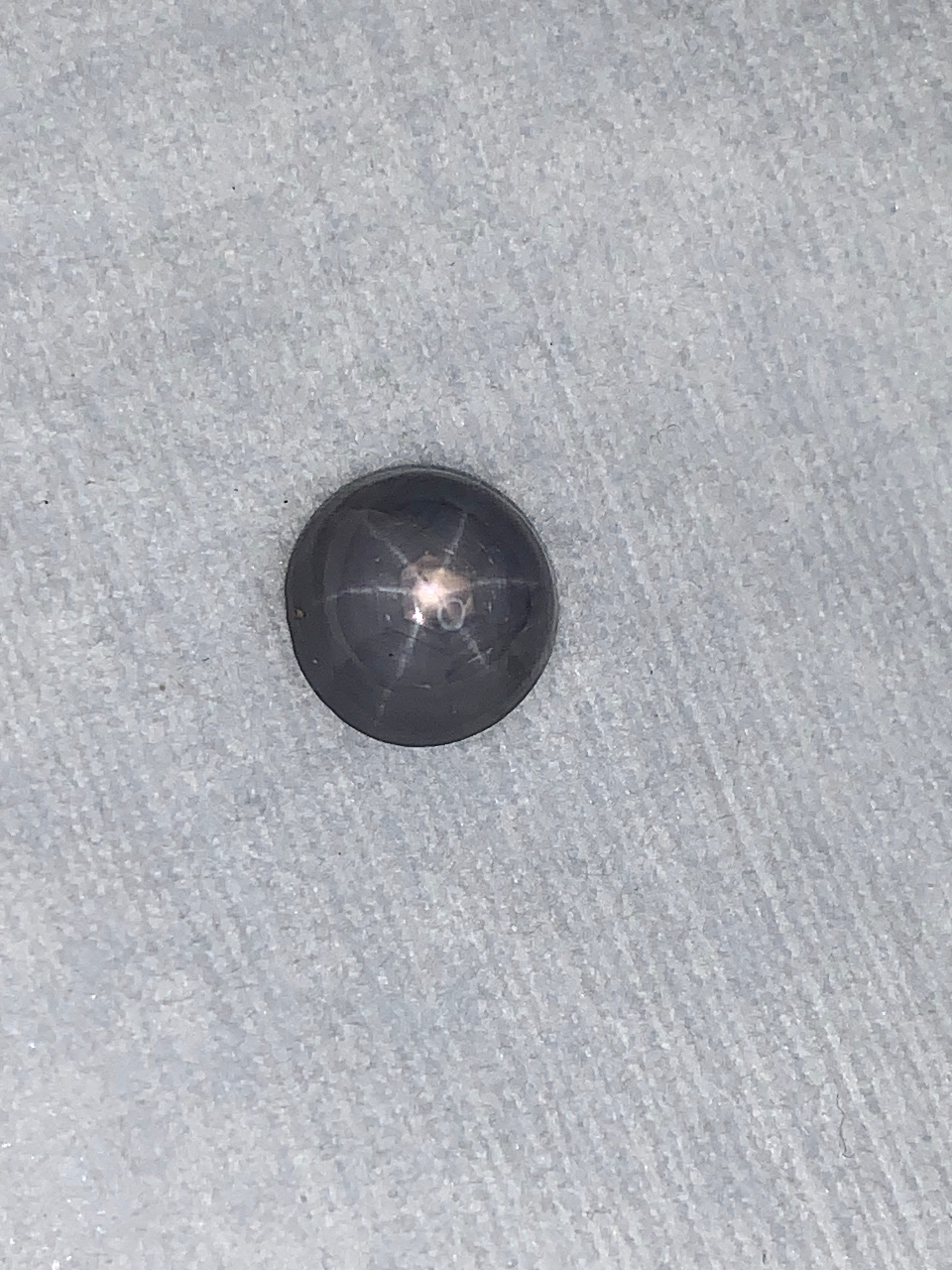 5.11 Carat Round Bluish Grey Star Sapphire Cabochon