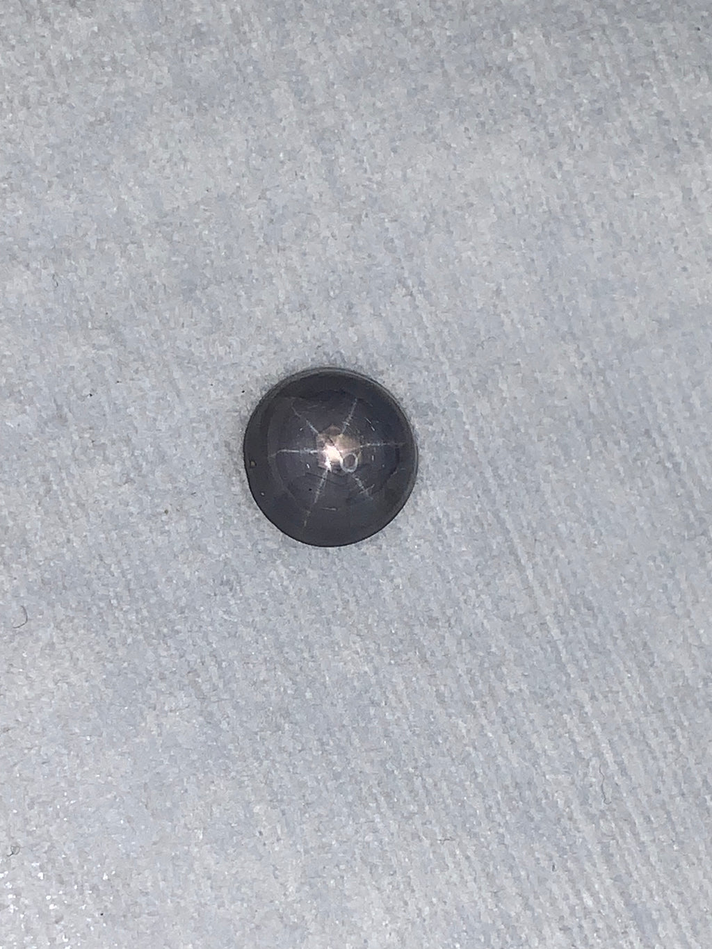 5.11 Carat Round Bluish Grey Star Sapphire Cabochon