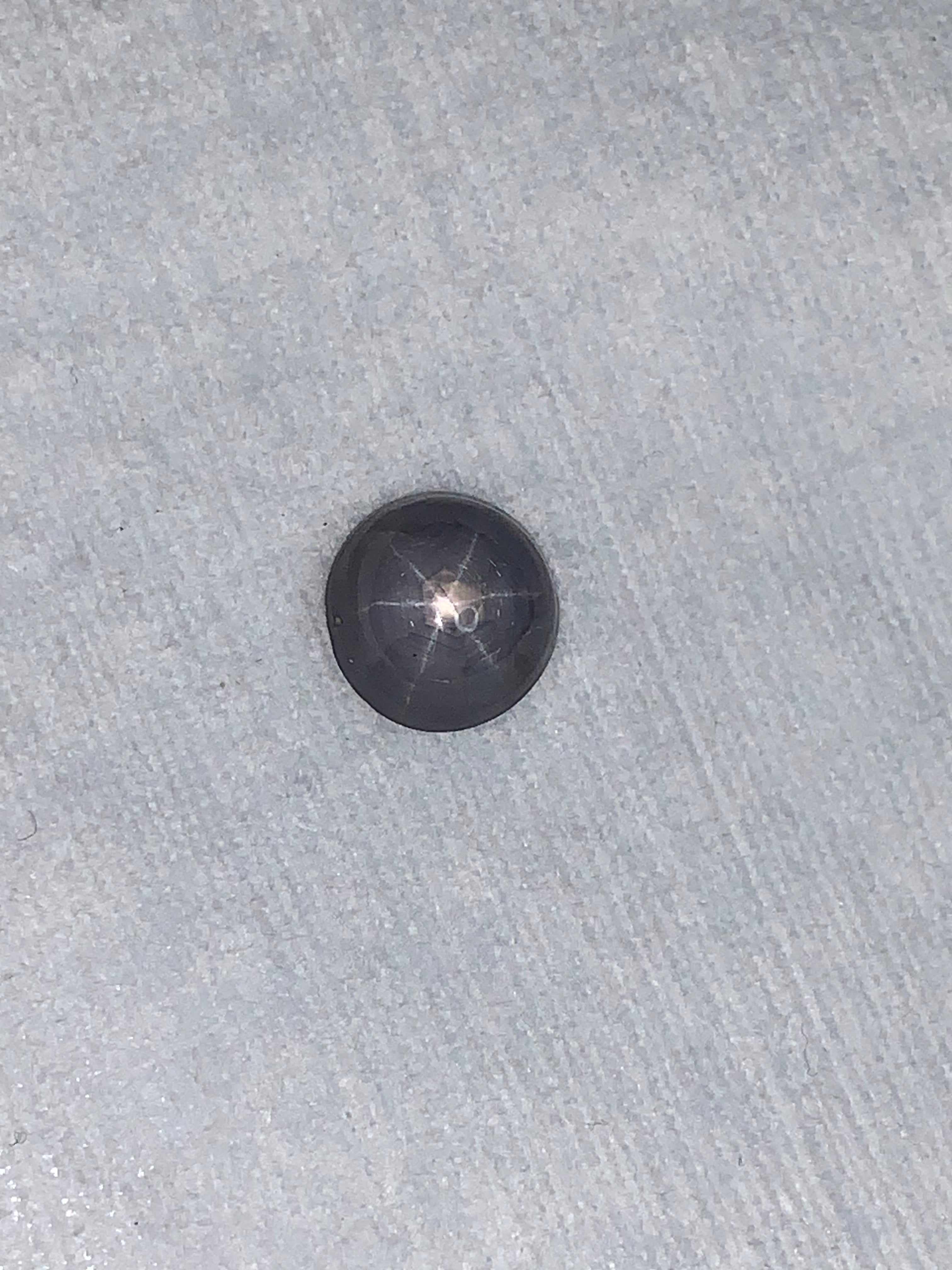 5.11 Carat Round Bluish Grey Star Sapphire Cabochon