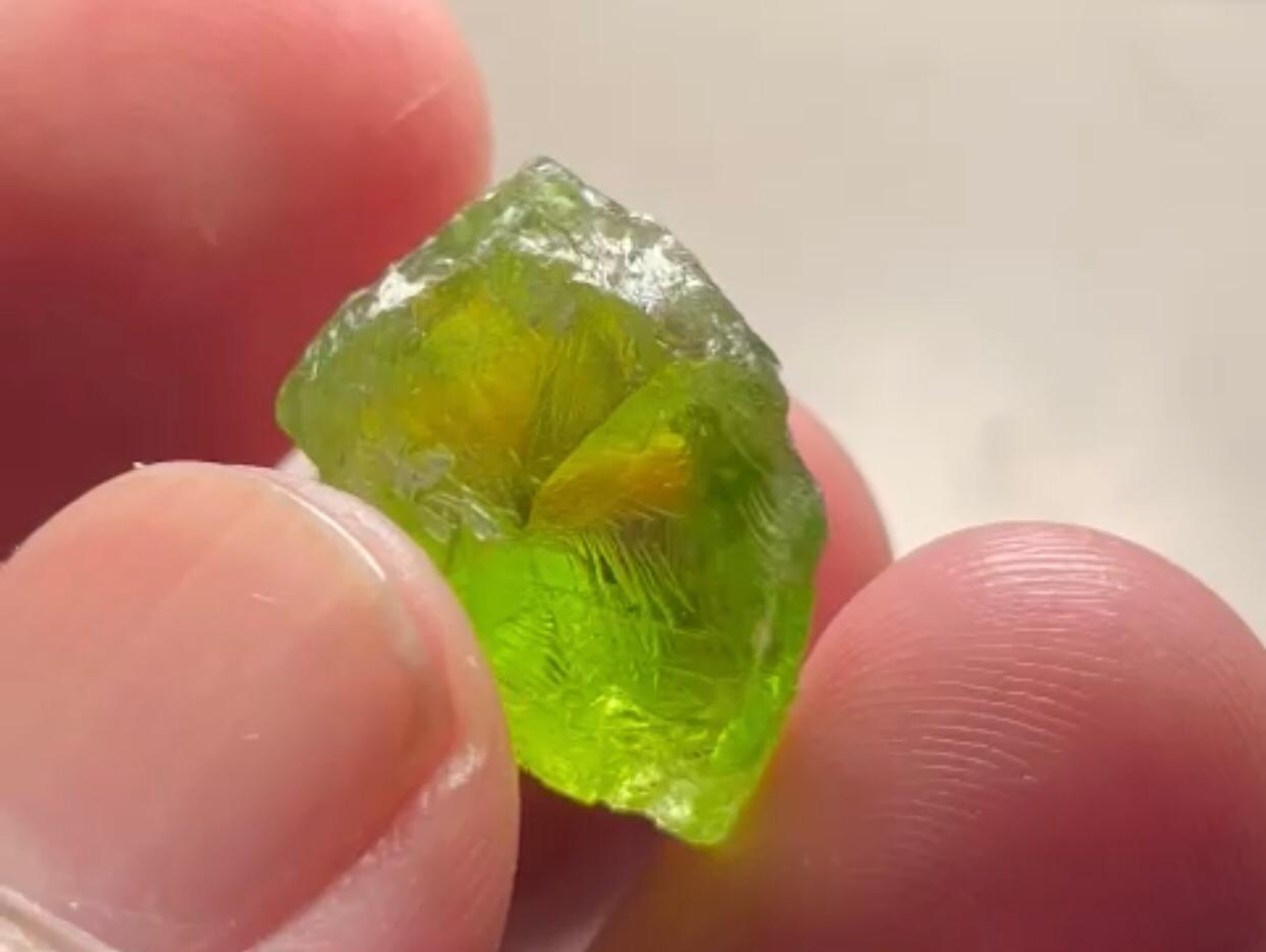 Check Out This CLose Image Of This Rough Peridot Crystal